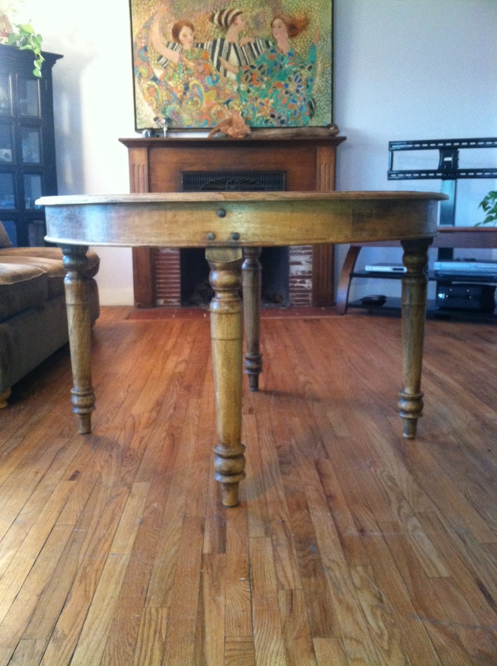 Antique wooden round table four legs InstAppraisal